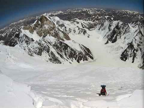 
Michl Dacher climbs through deep snow to the K2 Shoulder, looking Northeast - All Fourteen 8000ers (Reinhold Messner) book
